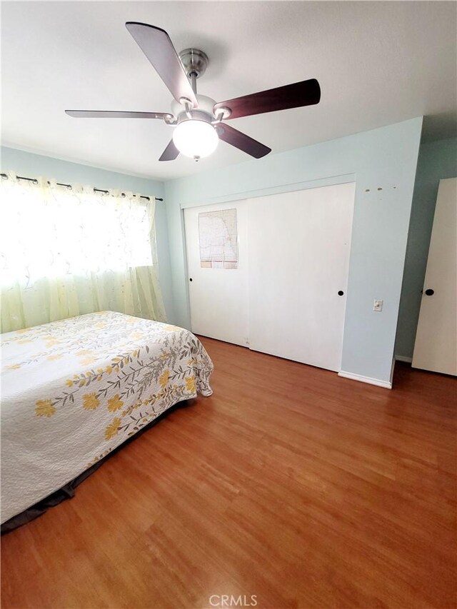 17762 Palo Verde Ave, Cerritos, CA 90703 - bedroom with wood finished floors, a ceiling fan, and a closet