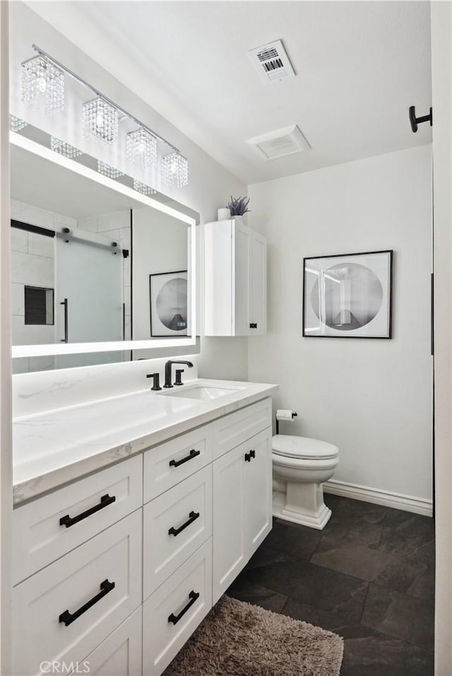 bathroom with visible vents, baseboards, toilet, and vanity