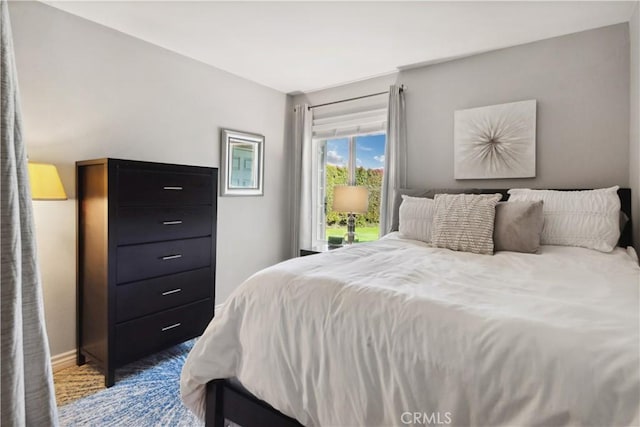 bedroom with baseboards