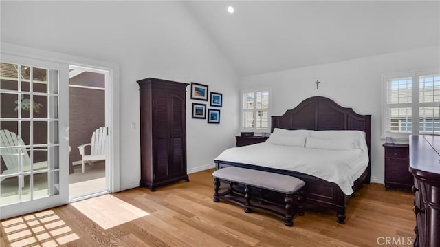 2617 Huntington Ln Unit B, Redondo Beach, CA 90278 - bedroom featuring access to outside, high vaulted ceiling, light wood-style floors, and recessed lighting