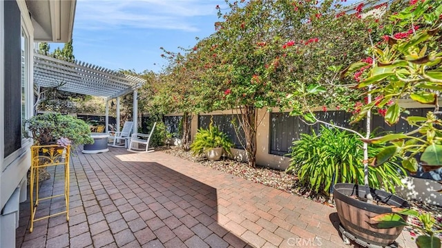 2617 Huntington Ln Unit B, Redondo Beach, CA 90278 - view of patio featuring a pergola and a fenced backyard
