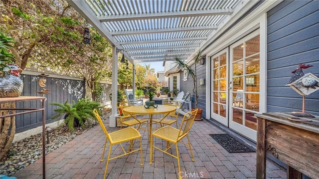 2617 Huntington Ln Unit B, Redondo Beach, CA 90278 - view of patio / terrace featuring french doors, a pergola, outdoor dining space, and a fenced backyard