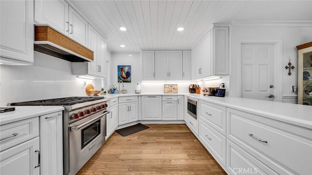 2617 Huntington Ln Unit B, Redondo Beach, CA 90278 - kitchen featuring stainless steel appliances, custom range hood, recessed lighting, white cabinets, and light countertops