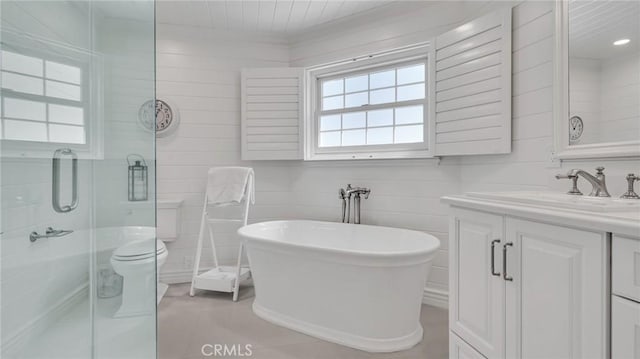 2617 Huntington Ln Unit B, Redondo Beach, CA 90278 - bathroom with vanity, a stall shower, and a freestanding bath