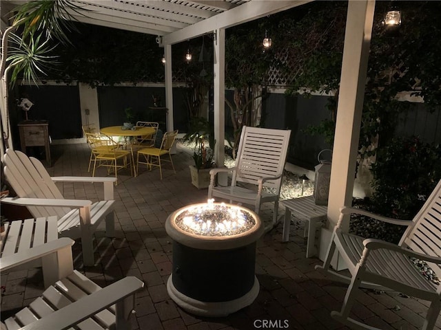 2617 Huntington Ln Unit B, Redondo Beach, CA 90278 - fenced backyard featuring a fire pit, a pergola, a patio, and outdoor dining space