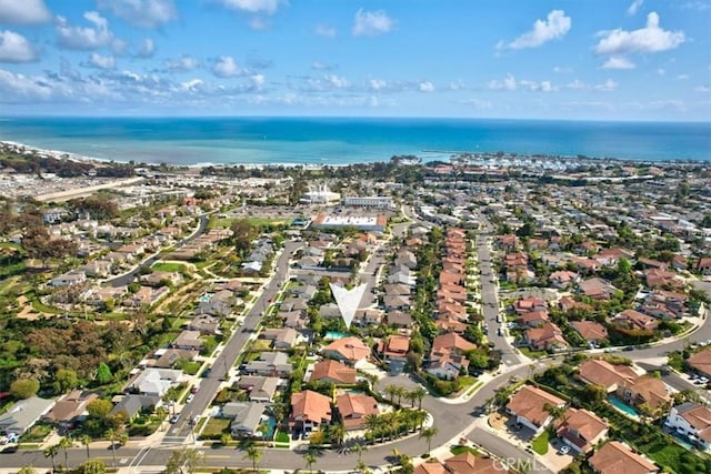 bird's eye view with a water view and a residential view