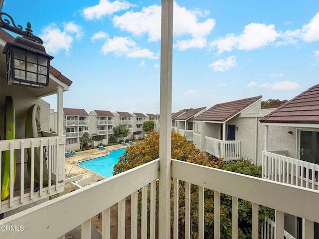 balcony featuring a residential view