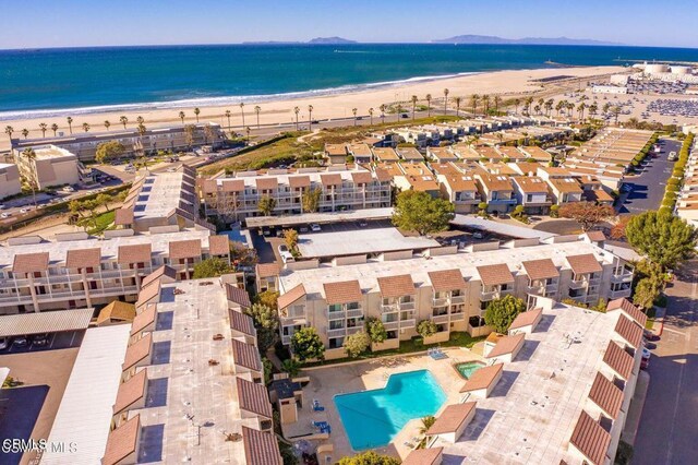 aerial view with a beach view and a water view