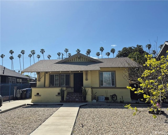 4911 S Wilton Pl, Los Angeles, CA 90062 - view of front of home featuring a shingled roof