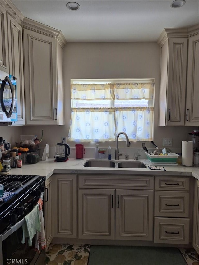 4911 S Wilton Pl, Los Angeles, CA 90062 - kitchen with black appliances, light countertops, and recessed lighting