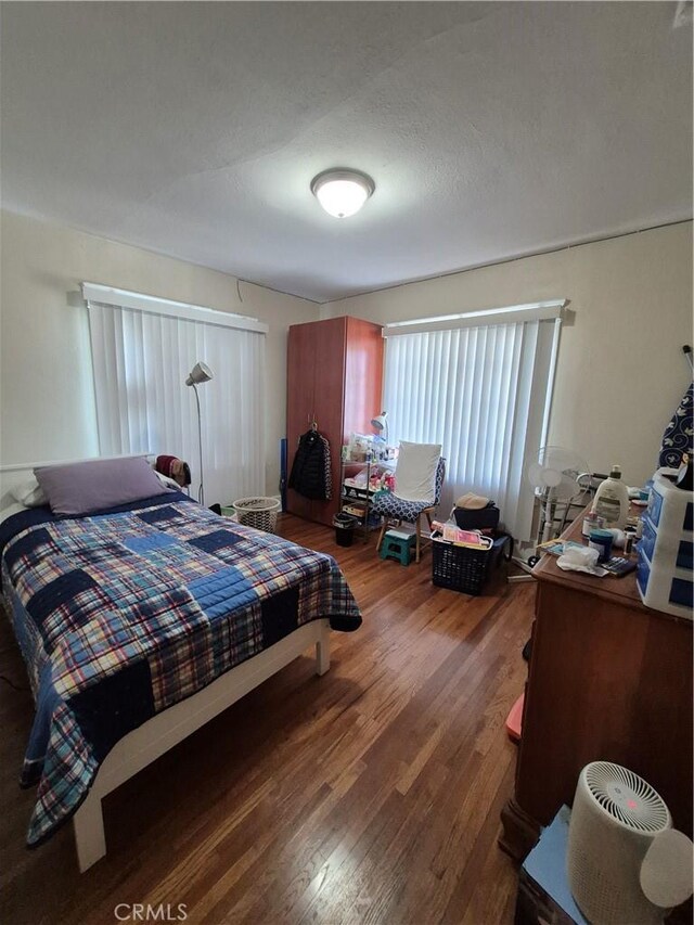 4911 S Wilton Pl, Los Angeles, CA 90062 - bedroom featuring wood finished floors