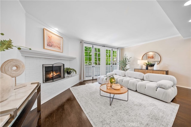 1930 S Beverly Glen Blvd Unit 103, Los Angeles, CA 90025 - living room with crown molding, a fireplace, wood finished floors, baseboards, and recessed lighting