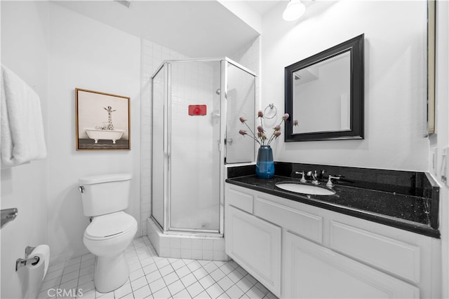 1930 S Beverly Glen Blvd Unit 103, Los Angeles, CA 90025 - full bathroom featuring tile patterned flooring, a stall shower, toilet, and vanity