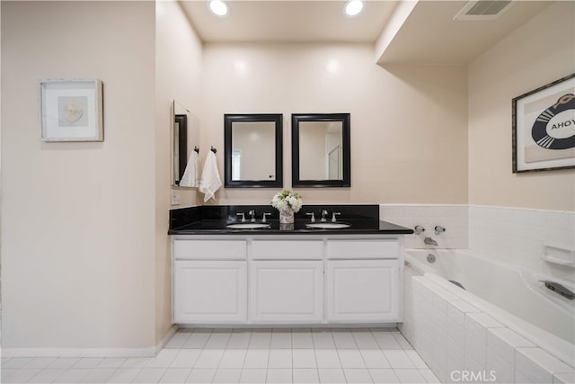 1930 S Beverly Glen Blvd Unit 103, Los Angeles, CA 90025 - bathroom with a garden tub, double vanity, tile patterned floors, and recessed lighting
