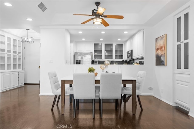1930 S Beverly Glen Blvd Unit 103, Los Angeles, CA 90025 - dining room with dark wood-type flooring, a ceiling fan, baseboards, recessed lighting, and a chandelier