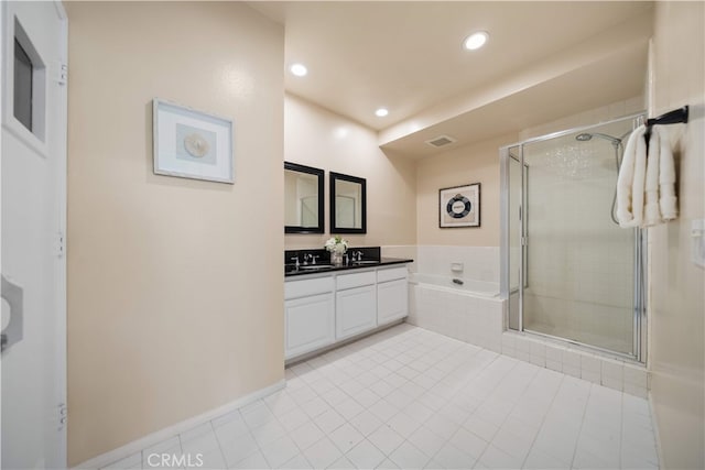 1930 S Beverly Glen Blvd Unit 103, Los Angeles, CA 90025 - bathroom with a shower stall, recessed lighting, a garden tub, tile patterned flooring, and vanity