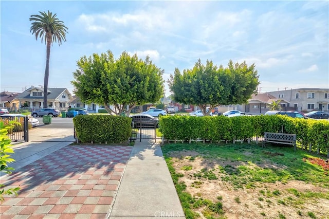 view of yard with fence and a residential view