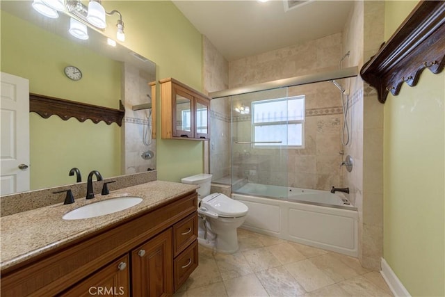 full bath with enclosed tub / shower combo, toilet, and vanity