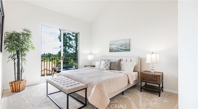 bedroom featuring baseboards, light colored carpet, access to exterior, and vaulted ceiling