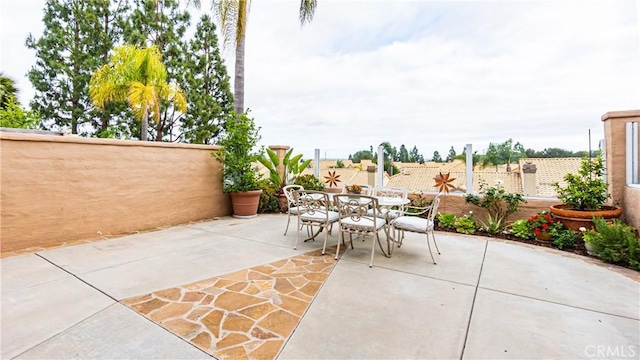 view of patio / terrace with fence and outdoor dining space