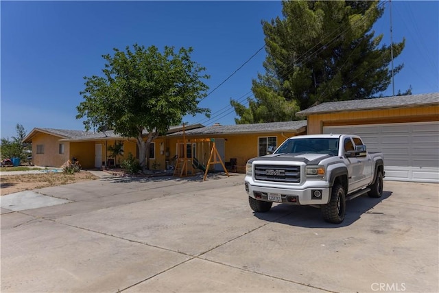8782 Peach Ave, Hesperia, CA 92345 - single story home with a garage