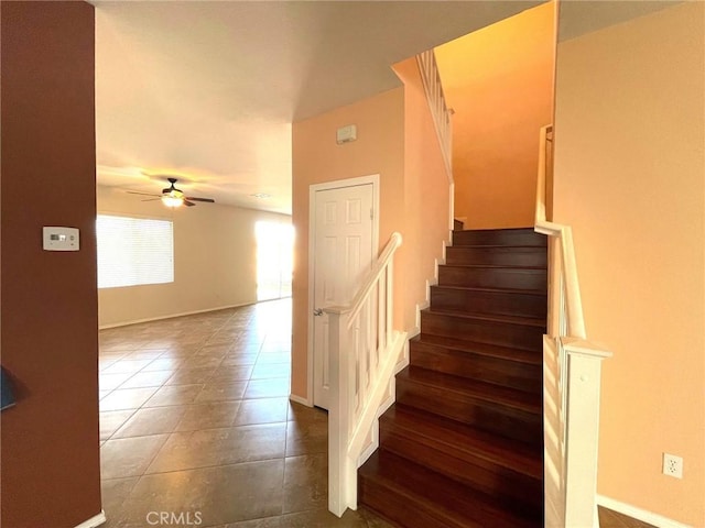 31556 Umbria Ln, Winchester, CA 92596 - stairs with a ceiling fan and tile patterned flooring