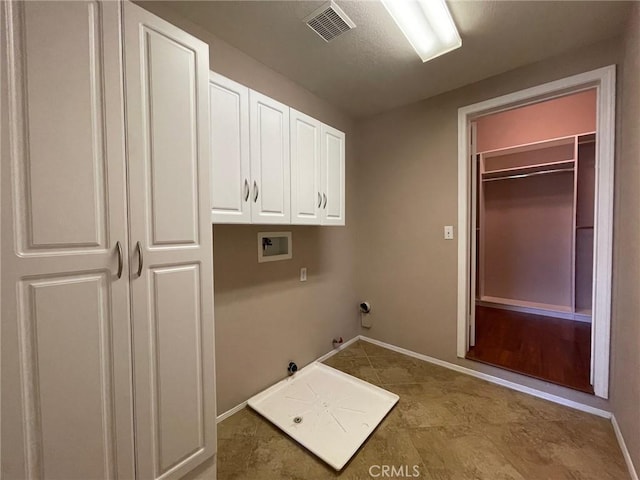31556 Umbria Ln, Winchester, CA 92596 - laundry area with hookup for a gas dryer, hookup for a washing machine, and cabinet space