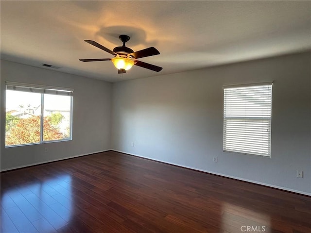 31556 Umbria Ln, Winchester, CA 92596 - empty room with dark wood-type flooring and a ceiling fan