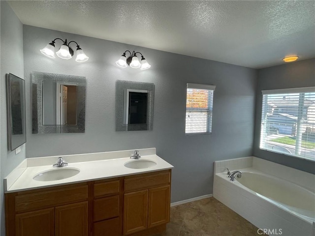 31556 Umbria Ln, Winchester, CA 92596 - full bathroom featuring a textured ceiling, double vanity, and a garden tub