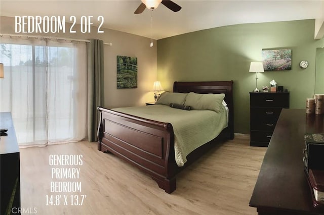 bedroom with light wood-style floors and a ceiling fan