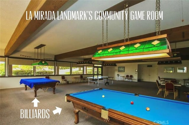 recreation room featuring carpet, pool table, and beamed ceiling