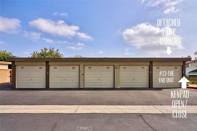 view of home's community with community garages