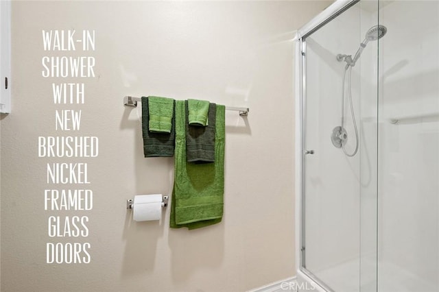 bathroom with a stall shower