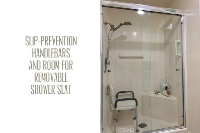 bathroom featuring a shower stall