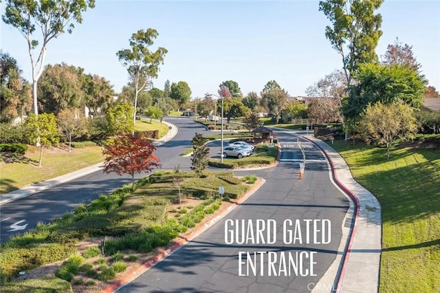 view of road with curbs
