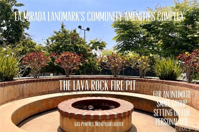 exterior space featuring an outdoor fire pit