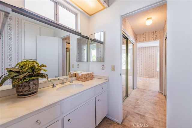 578 Vista Rambla, Walnut, CA 91789 - bathroom with vanity, plenty of natural light, and wallpapered walls