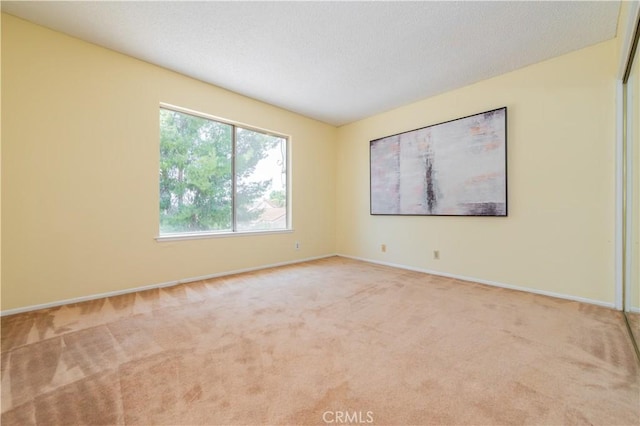 578 Vista Rambla, Walnut, CA 91789 - unfurnished room featuring light carpet, baseboards, and a textured ceiling