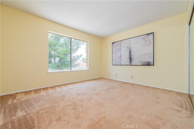 578 Vista Rambla, Walnut, CA 91789 - unfurnished room with light carpet, baseboards, and a textured ceiling
