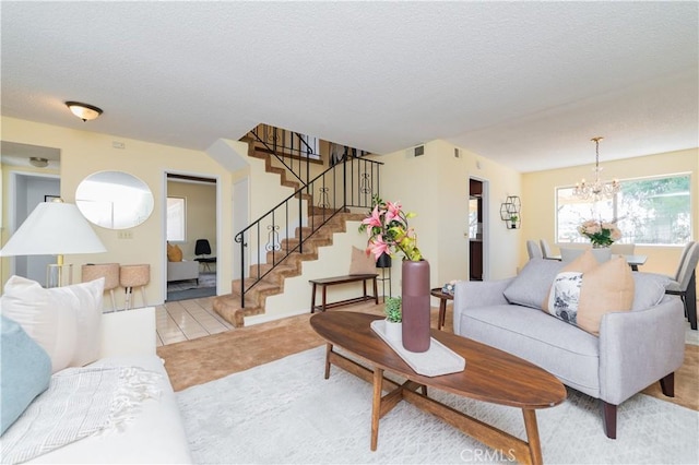 578 Vista Rambla, Walnut, CA 91789 - living area featuring stairway, a chandelier, and a textured ceiling