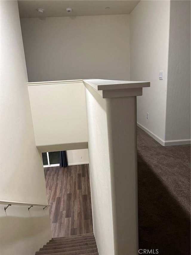 stairway with baseboards