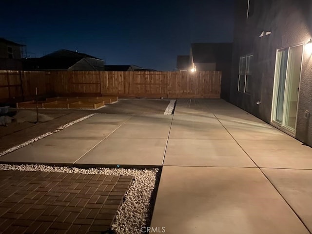 patio at twilight with fence