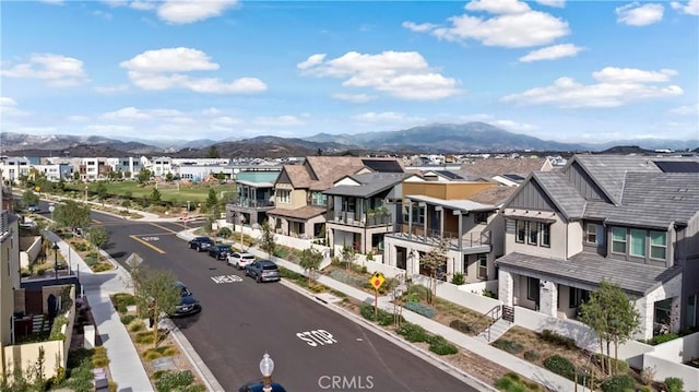 birds eye view of property featuring a mountain view and a residential view