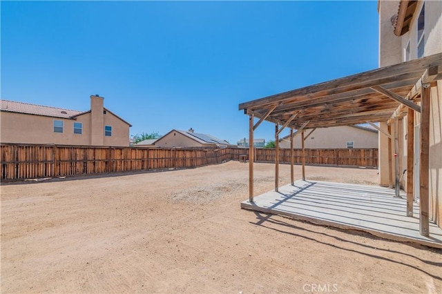14627 Palm St, Adelanto, CA 92301 - fenced backyard featuring a patio area