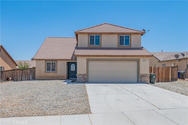 14627 Palm St, Adelanto, CA 92301 - view of front of property featuring stucco siding, driveway, an attached garage, and a tile roof