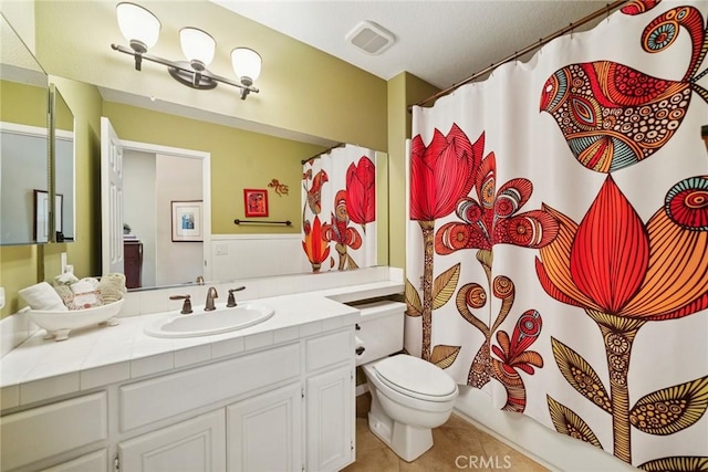 33046 Ocean Rdg, Dana Point, CA 92629 - full bath with vanity, tile patterned floors, toilet, and a shower with curtain