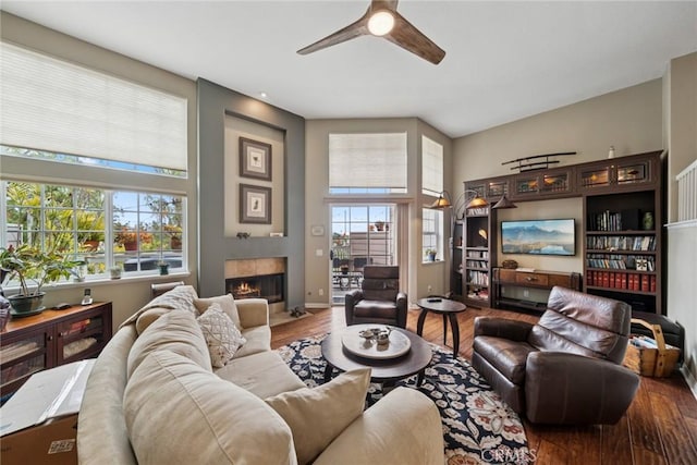 33046 Ocean Rdg, Dana Point, CA 92629 - living room with a high ceiling, ceiling fan, wood finished floors, and a tile fireplace