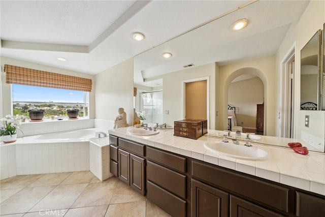 33046 Ocean Rdg, Dana Point, CA 92629 - bathroom featuring double vanity, a bath, tile patterned flooring, a shower stall, and a sink