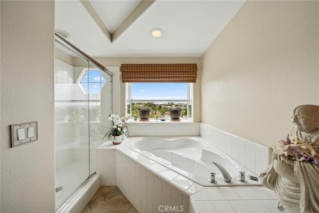 33046 Ocean Rdg, Dana Point, CA 92629 - full bathroom with a bath, a shower stall, healthy amount of natural light, a textured wall, and tile patterned floors