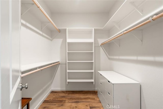 1982 Dawncrest Dr, Chico, CA 95928 - walk in closet featuring wood finished floors
